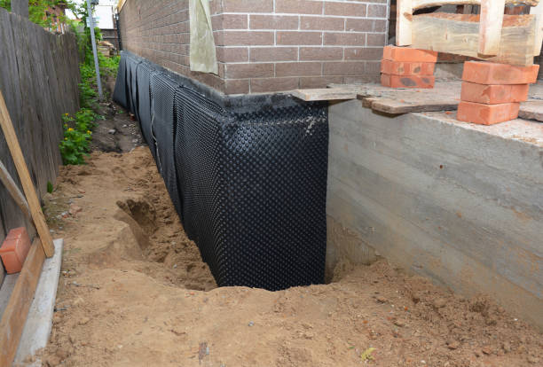 SJ Waterproofing Pros technician performing targeted Exterior Waterproofing assessment in Sperryville, VA